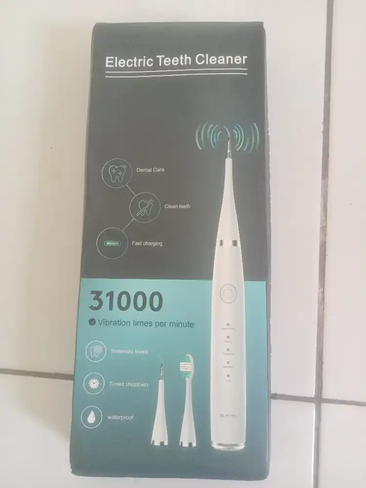 Pembersih karang gigi portabel