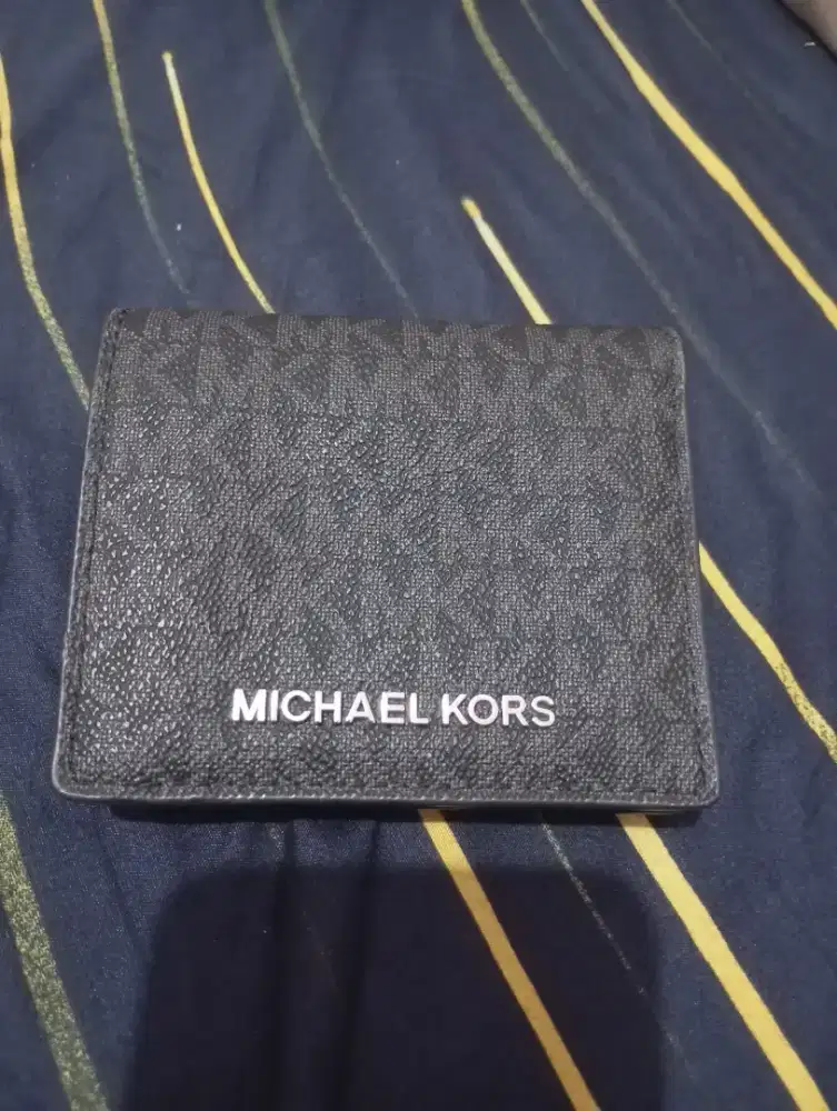 Preloved dompet Michael Kors jet set