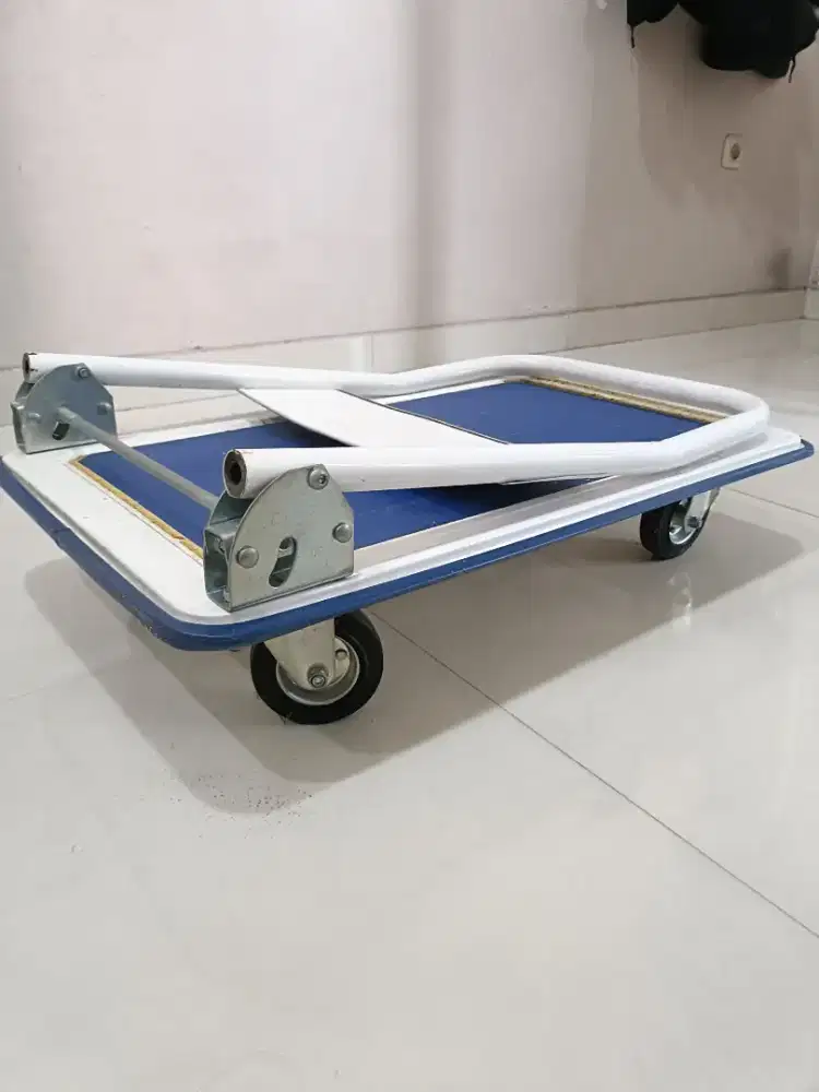 Trolly lipat - Troli pengangkut barang