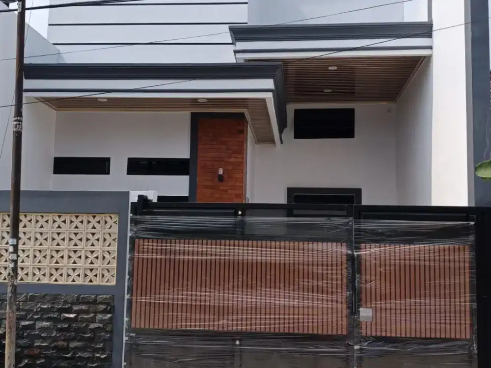 DIJUAL RUMAH TEMATIK KEKINIAN 1.5 LANTAI HARGA PROMO DI PERUMAHAN HARAPAN JAYA BEKASI UTARA