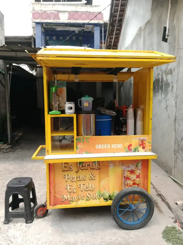 Gerobak teh solo dan jeruk peras