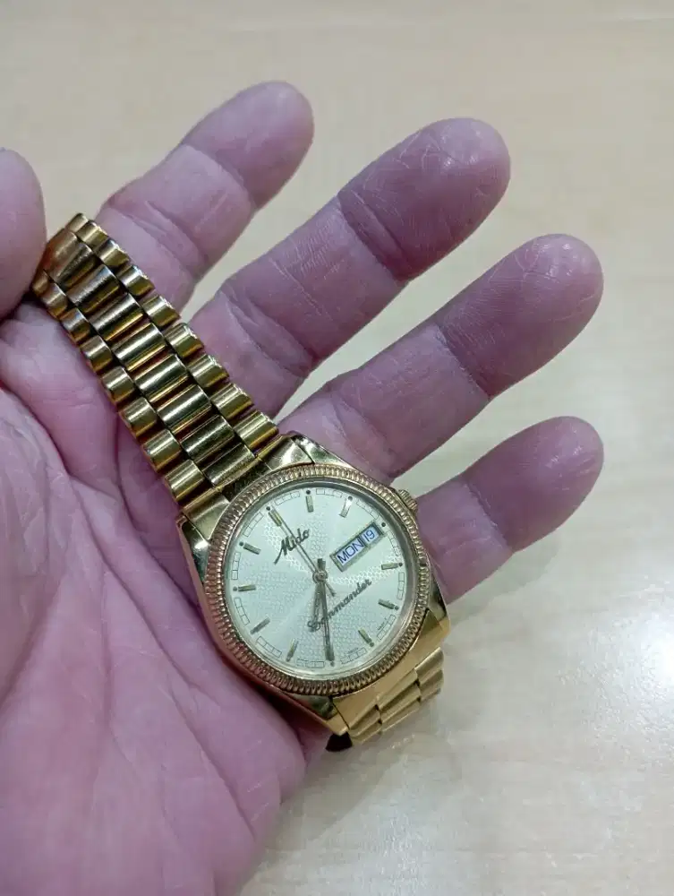 Jam tangan Mido kuning automatic klasic Swiss made