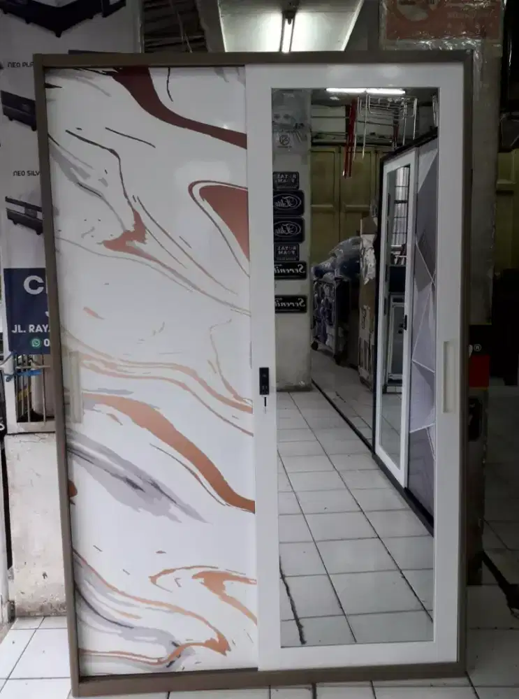 Lemari besi 2 pintu lebar 120