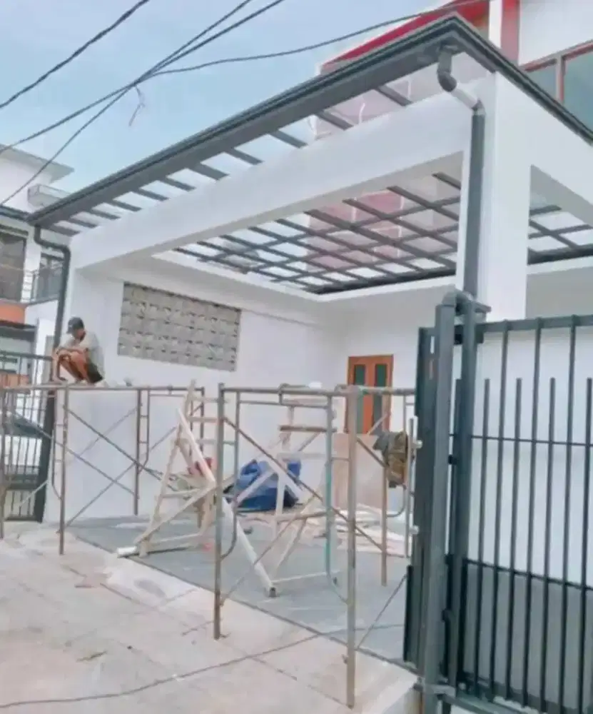 Pemasangan atap kaca