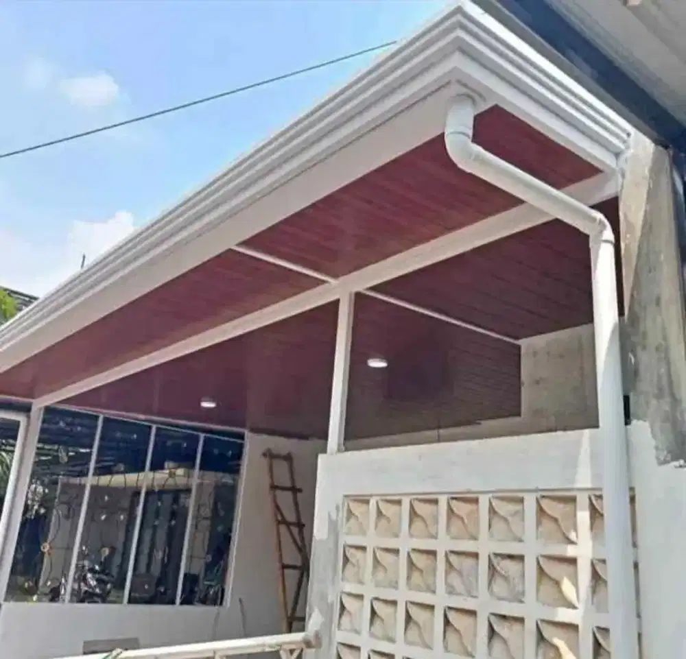 Pemasangan atap alderon dobel layer