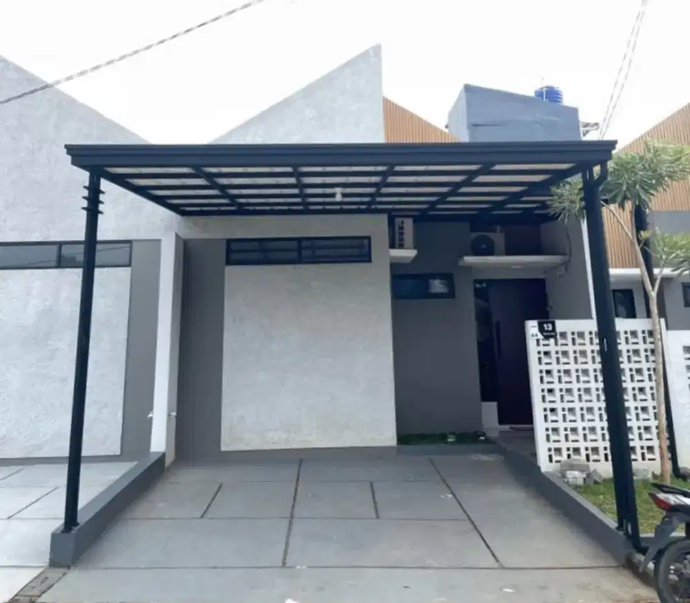 Pemasangan atap alderon dobel layer