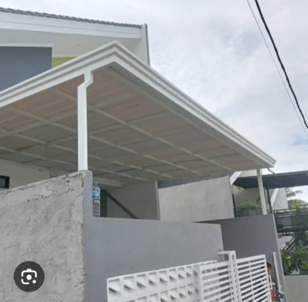 Pemasangan atap alderon singel