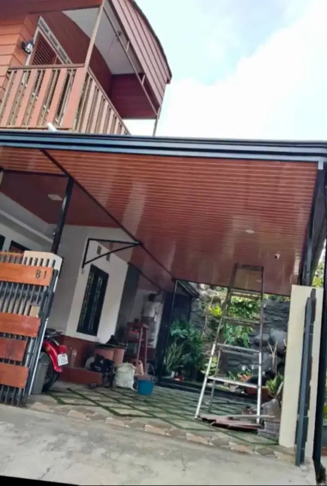 Pemasangan atap alderon rs minimalis