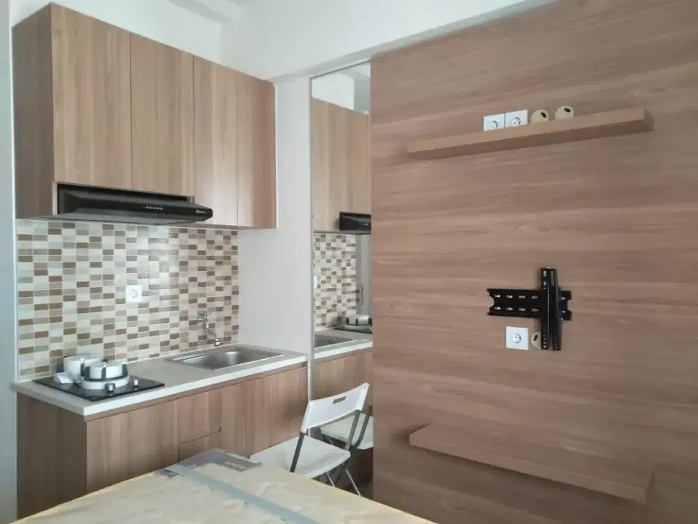 The green pramuka city apartment studio furnish per bulan