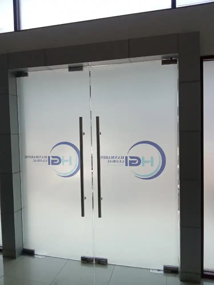 Jasa pasang sticker kaca film gedung