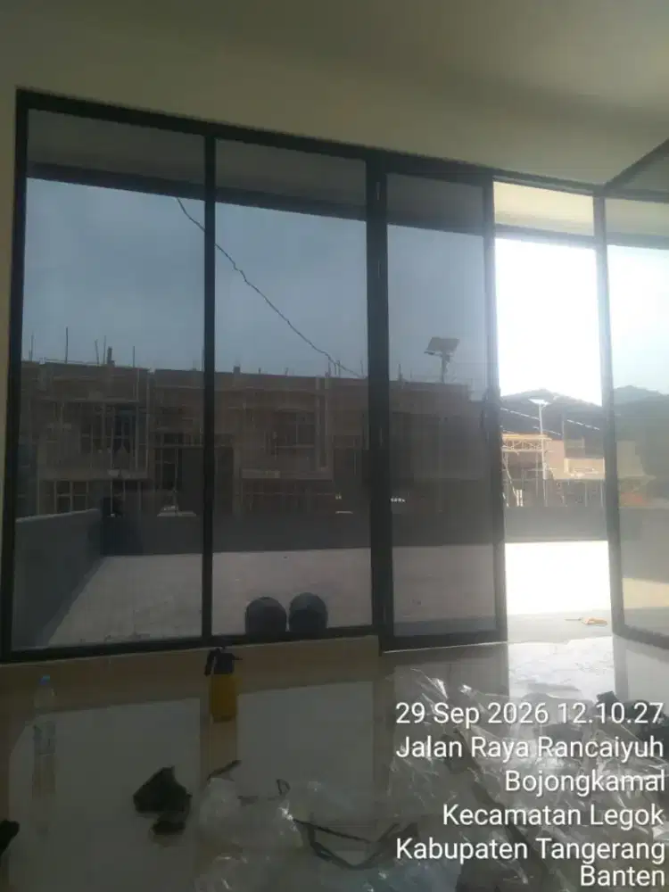 Jasa pasang sticker kaca film gedung