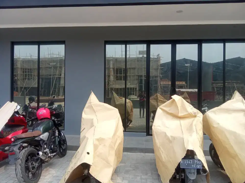 Jasa pasang sticker kaca film gedung