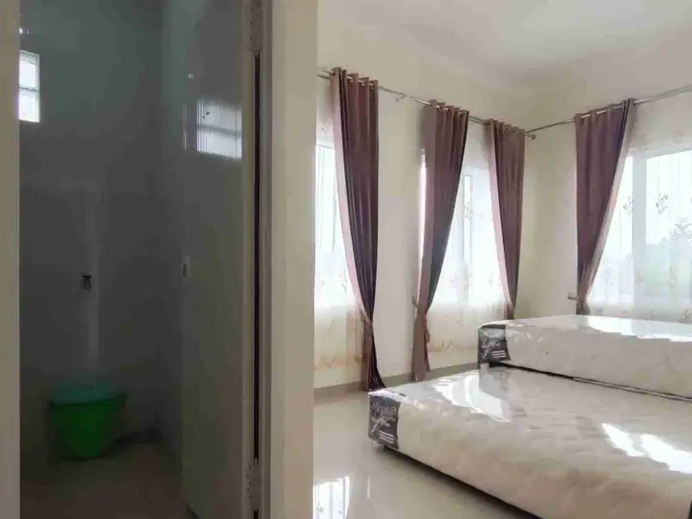 guest house atau kos kamar besar besar daerah suhat bagus buat investasi dan dekat jalan utama arah sudimoro suhat dekat kampus UB Brawijaya, polinema dan UNMUH