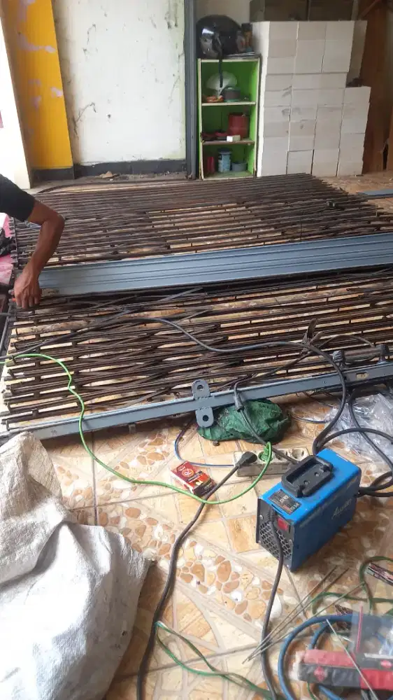 Tukang service rolling door folding gate murah area koja