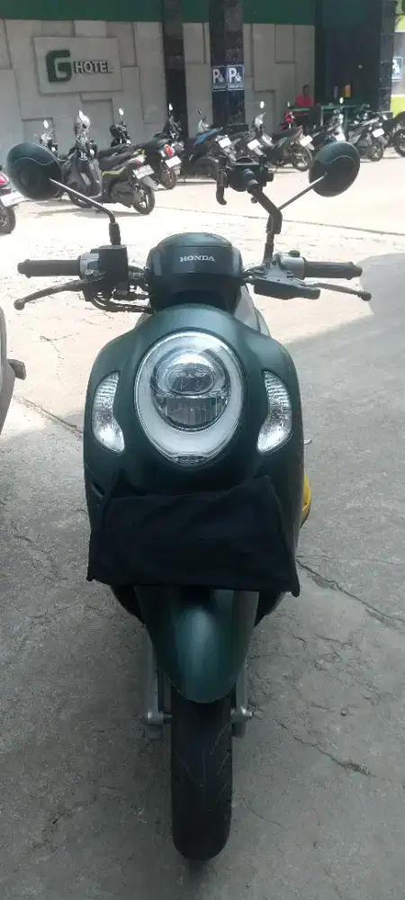 tex over.  motor Scoopy