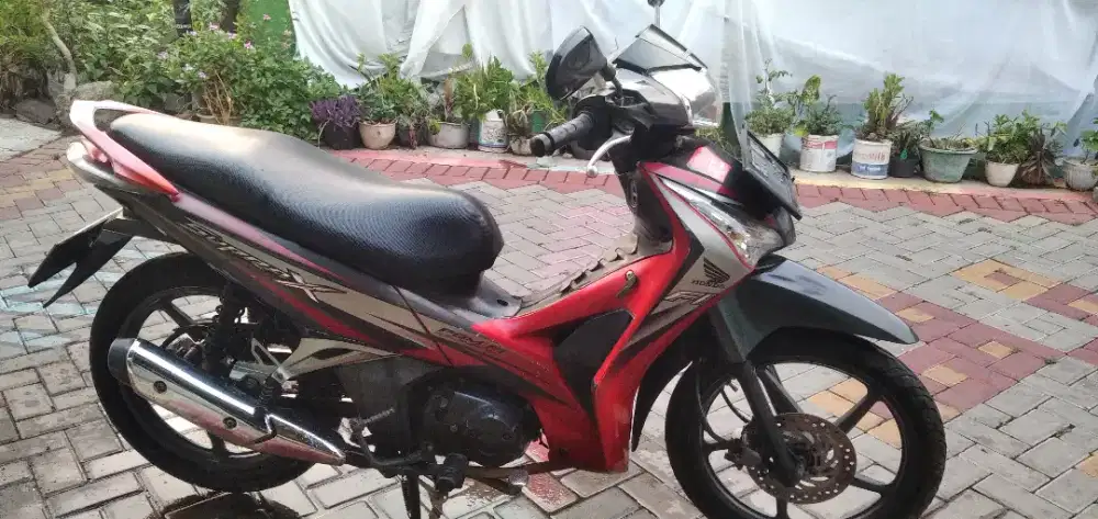 Honda Supra X 125 helm in Tahun 2012