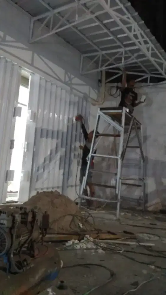 TUKANG SERVICE ROLLING DOOR FOLDING GATE MURAH AREA TAMAN SARI