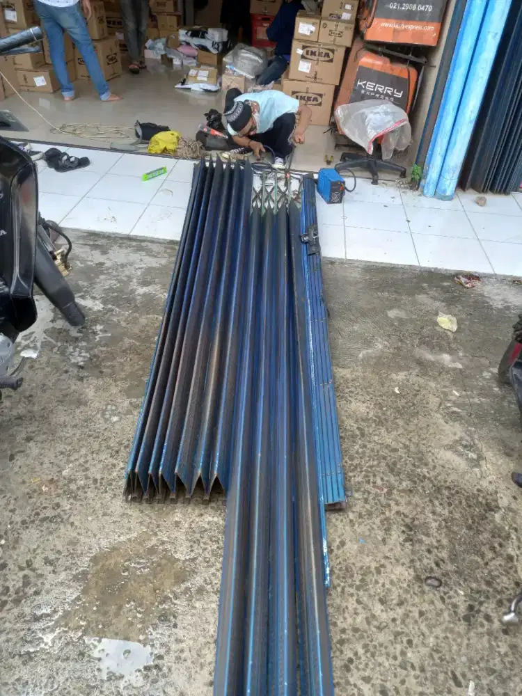 Tukang service rolling door folding gate murah area beji
