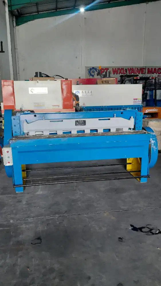 Mesin shearing mekanikal