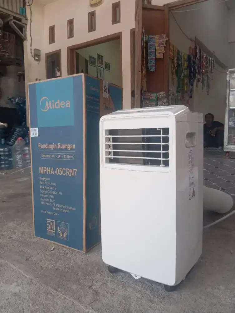 AC Portable Midea ½ PK