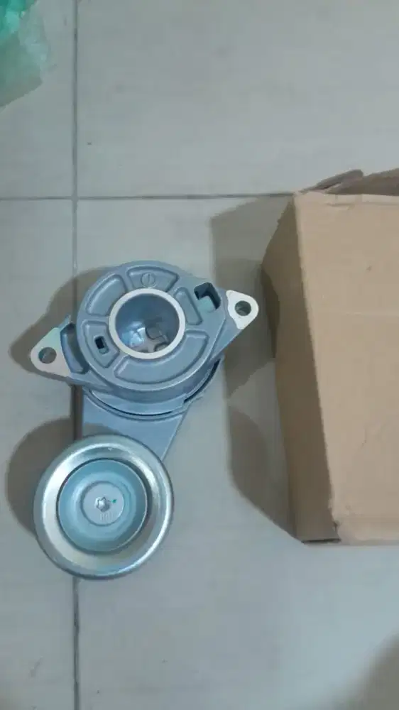 Tensioner fan belt jazz Dan Master kopling bawah aisin