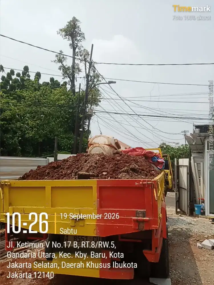 Buang puing bongkaran rumah