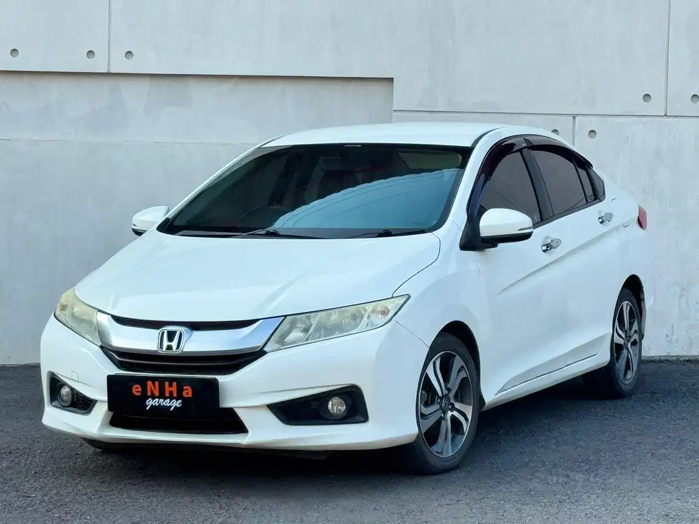 Dp 9 JT.. Honda City E 1.5 Matic 2015.. eNHa garage Semarang..