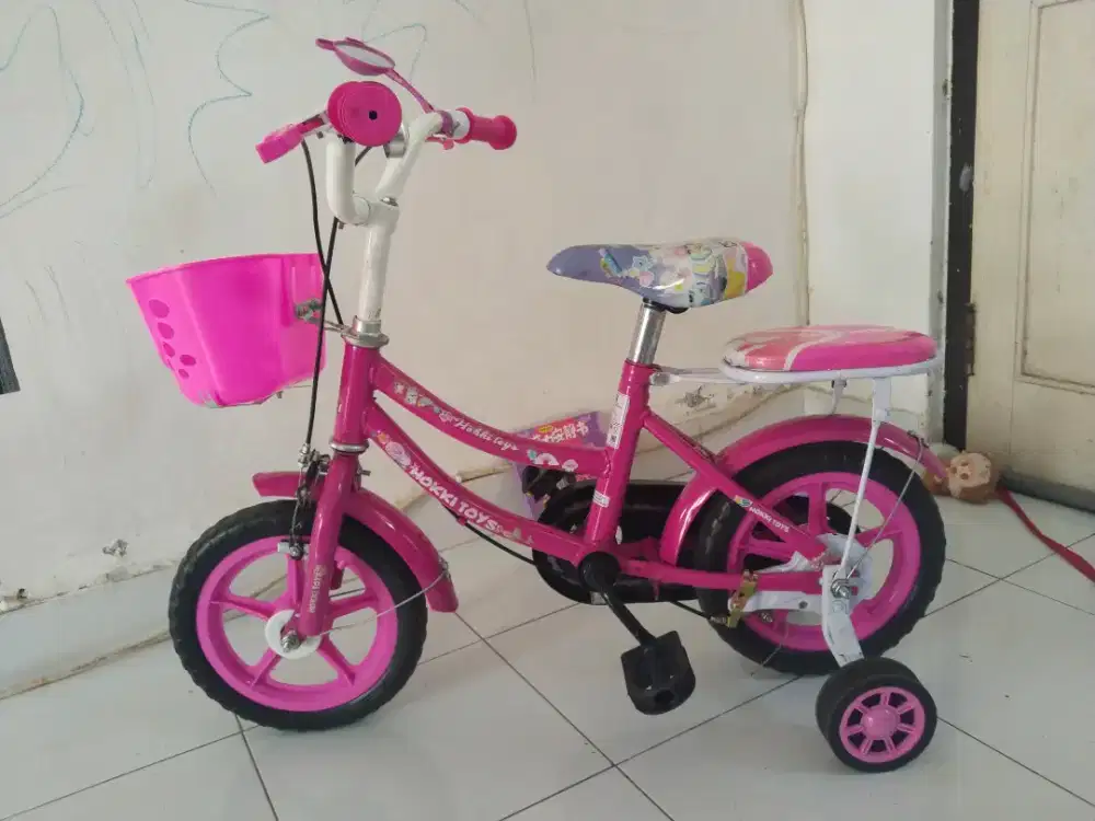 Sepeda anak perempuan uk 15