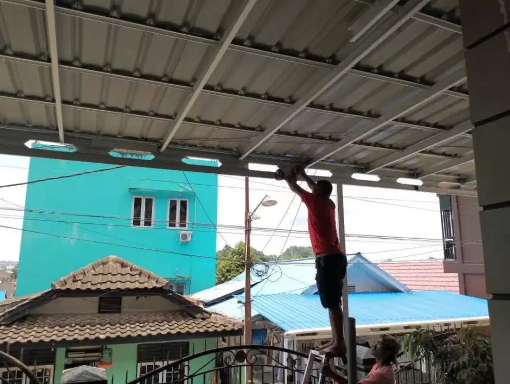 Baja ringan dan galvalum pasir terpasang