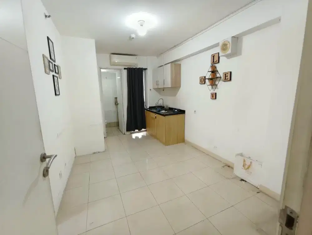 Disewakan setahun 2 BR unfurnish bassura di flamboyan free ipl