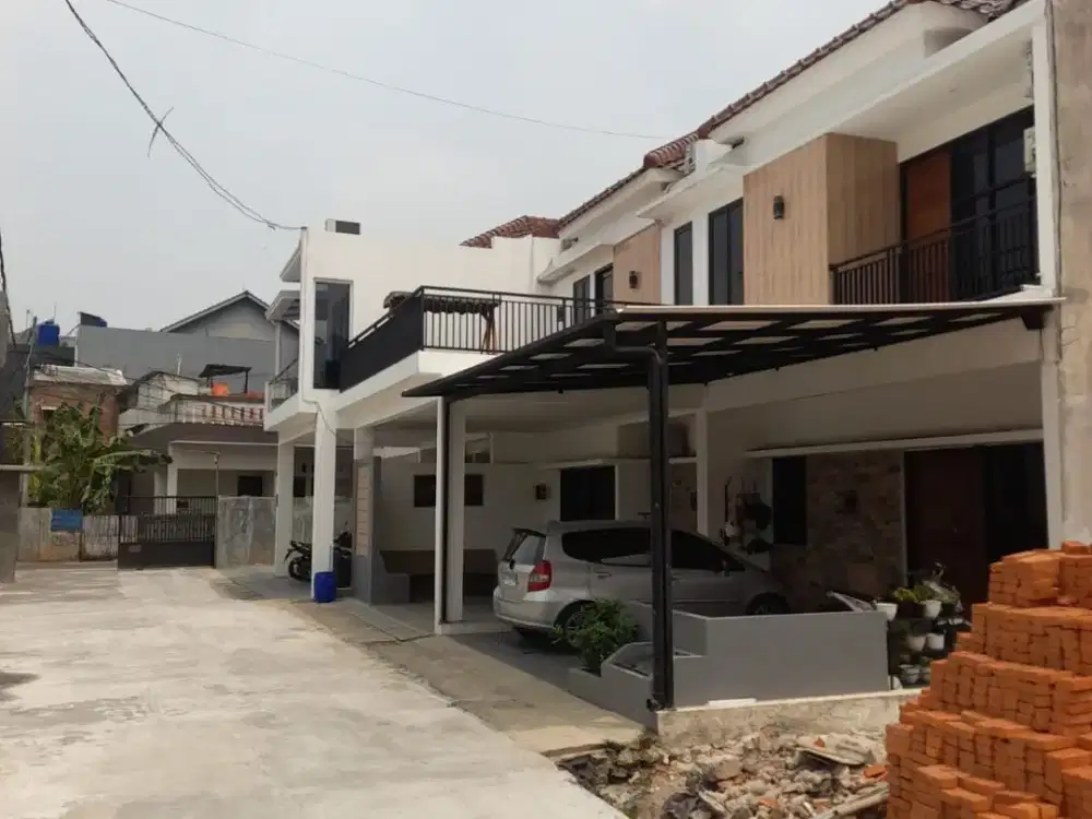 Rumah cluster cakep 2lantai mewah full bata merah bonus balcon lokasi bebas banjir dekat LRT Jatibening