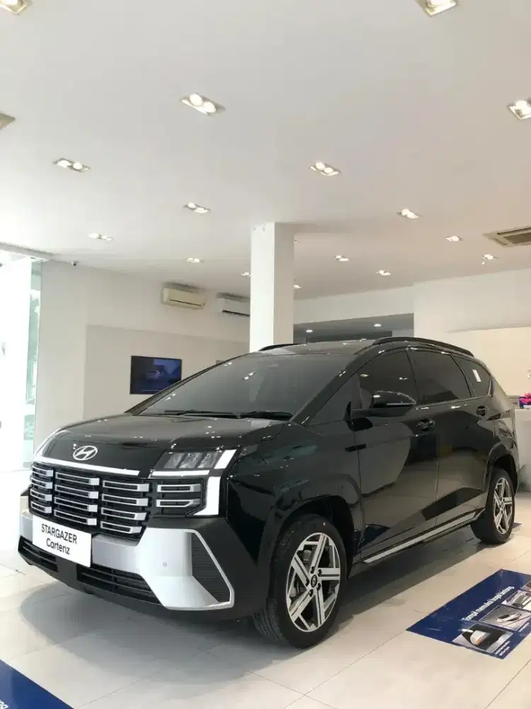 DP 15JT PROMO HYUNDAI CARTENZ