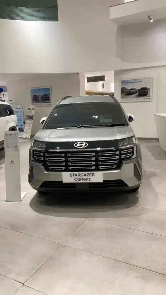 DP 15JT PROMO HYUNDAI CARTENZ