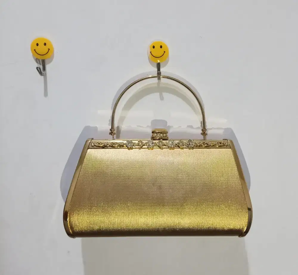 Tas pesta warna Gold