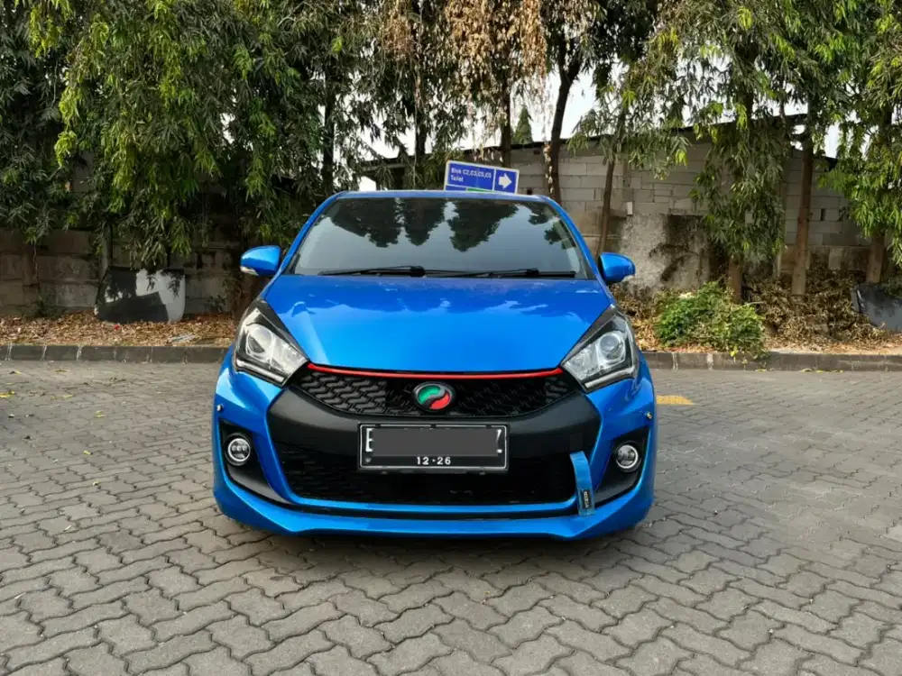 DAIHATSU SIRION RS M-SPORT 2015 AUTOMATIC - MOBIL BEKAS