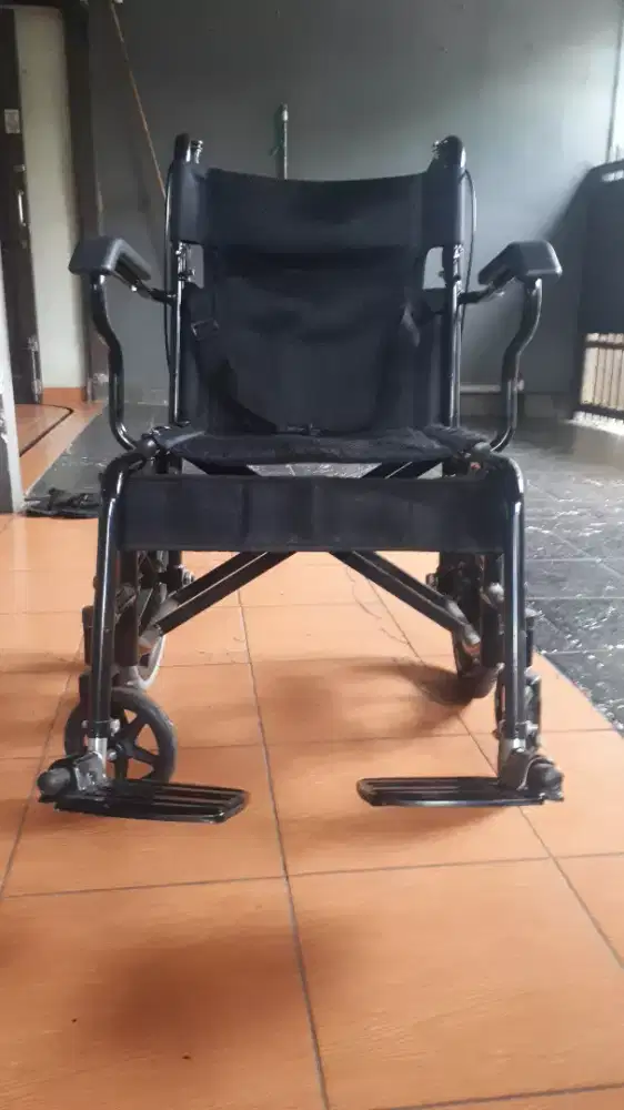kursi roda travel juara