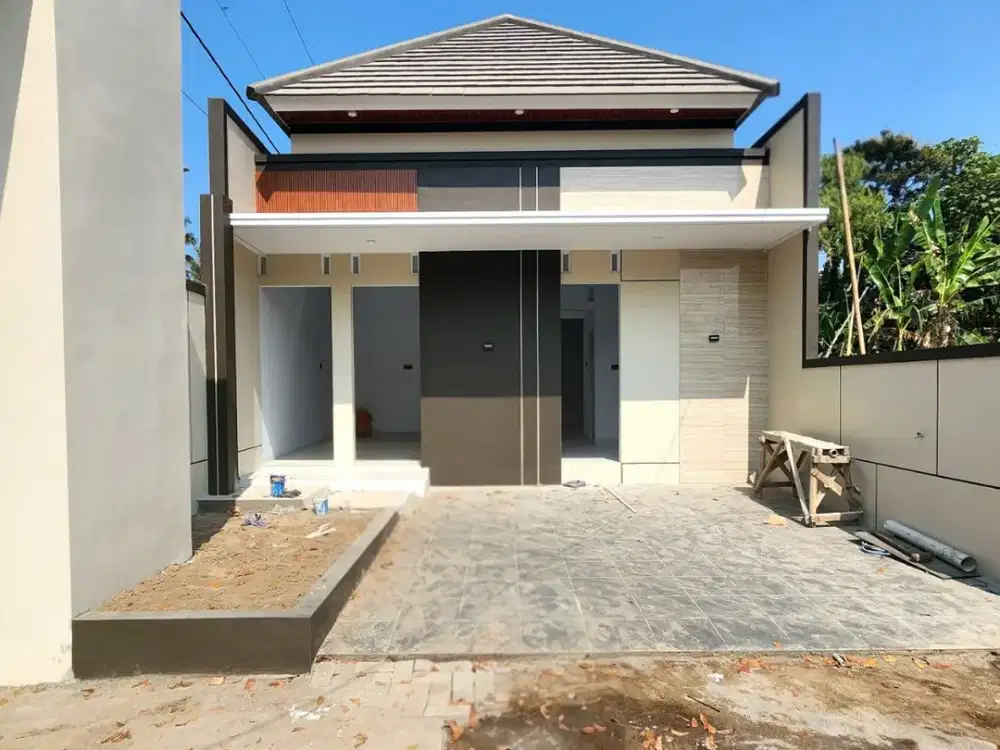RUMAH BARU DALAM CLUSTER DI KAWASAN BERKEMBANG SLEMAN BARAT