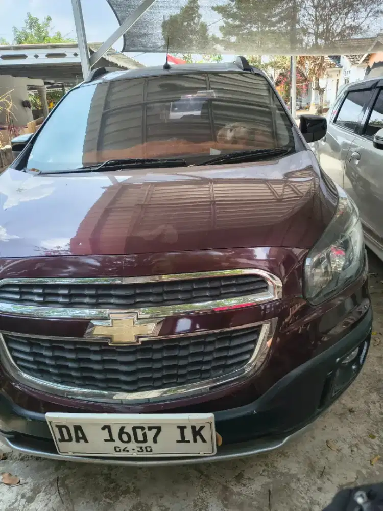 Di Jual Cepat Mobil Chevrolet warna marun Tahun 2014
