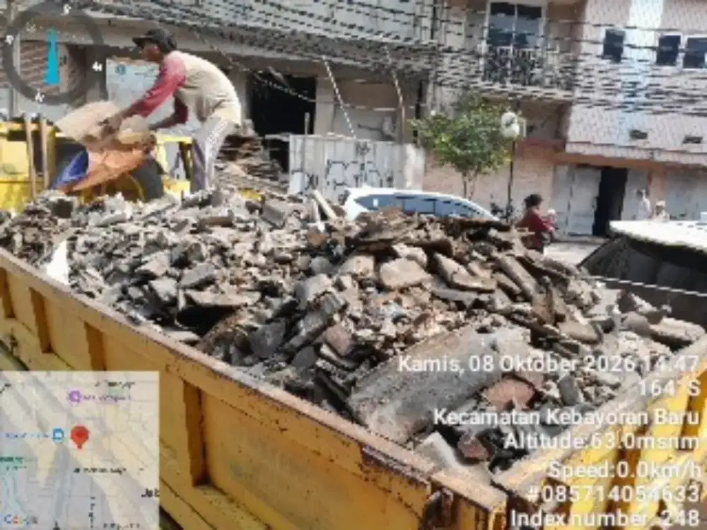 Buang puing sampah proyek