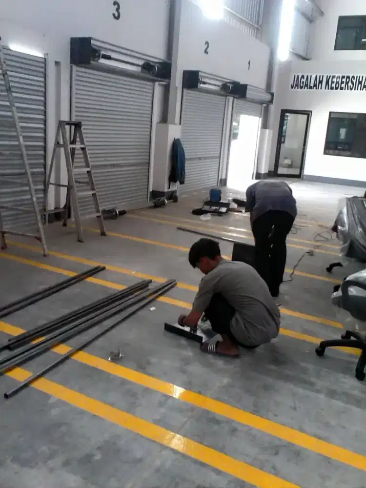 Tukang reparasi service rolling door dan folding gate murah
