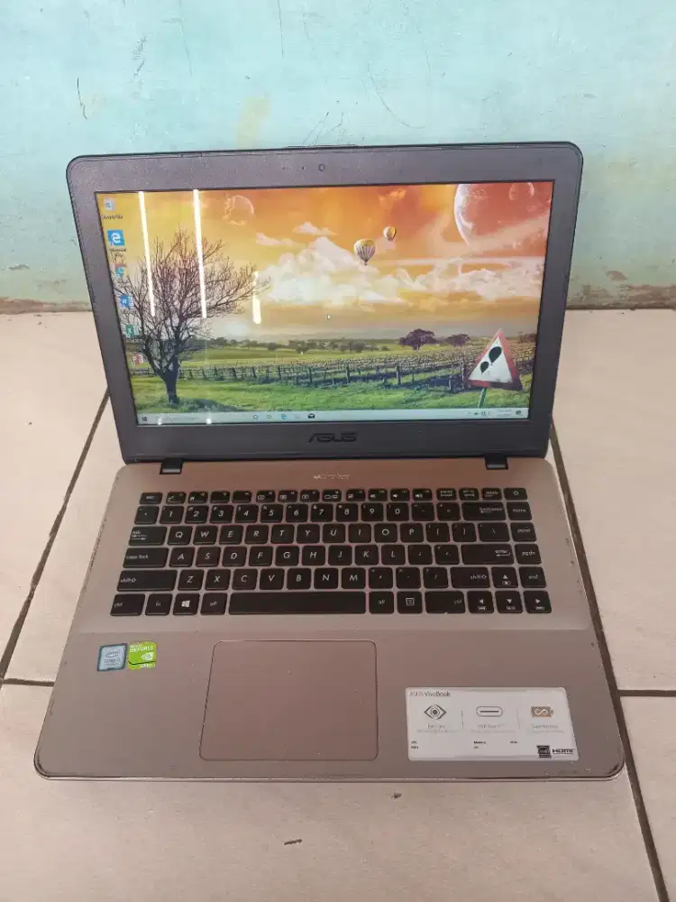 Beli tinggi laptop second