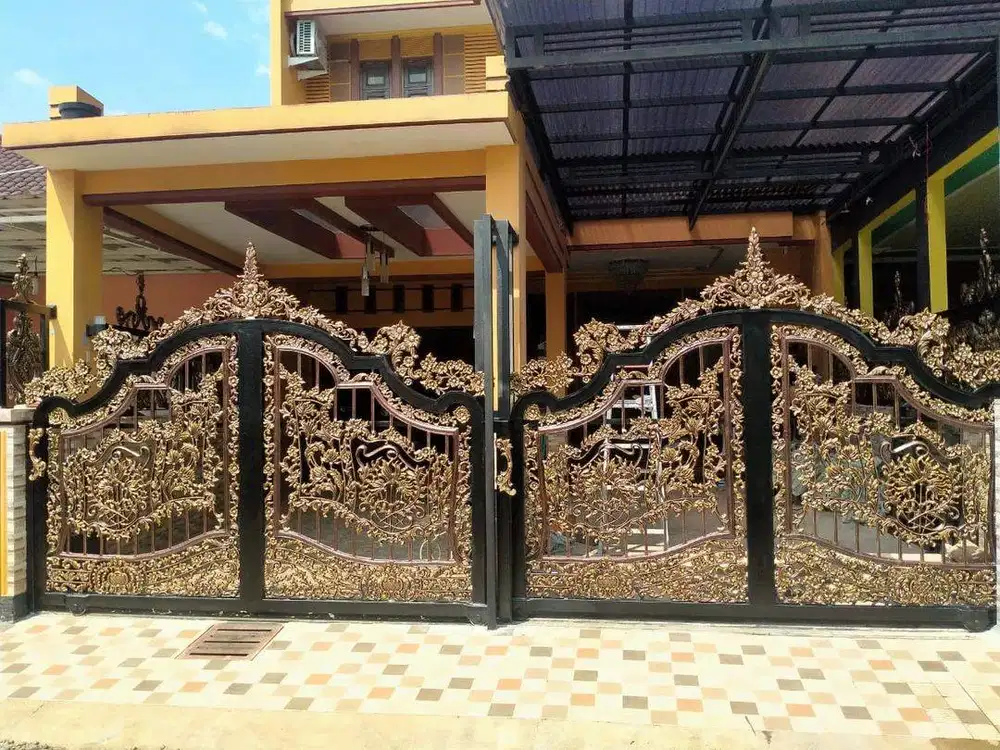 Pagar rumah besi tempa