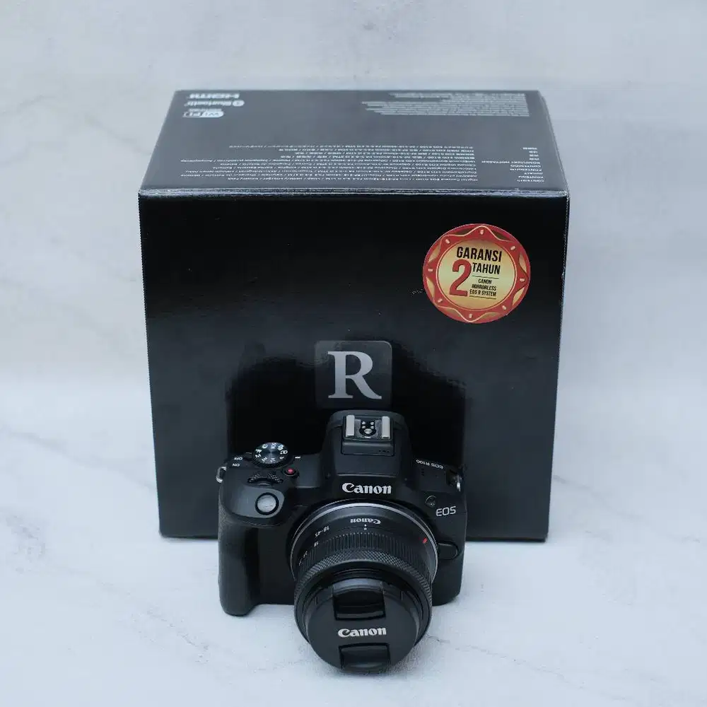 Mirrorless canon R100 lensa kit 18-45 like new pembelian agustus 2026