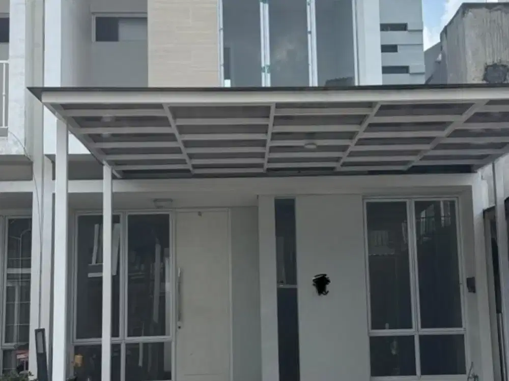 Dijual / Disewakan Rumah Cluster Yarra JGC: Carport 2 Mobil, Hadap Selatan
