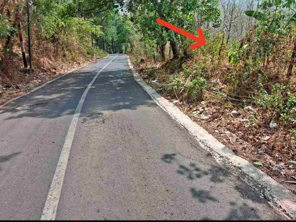 Tanah Kebun Pinggir Aspal samping sungai di Parangloe