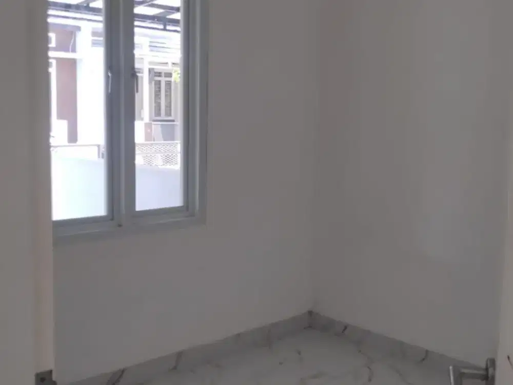 Rumah Minimalis  Cluster di Taman Kopo Indah 1