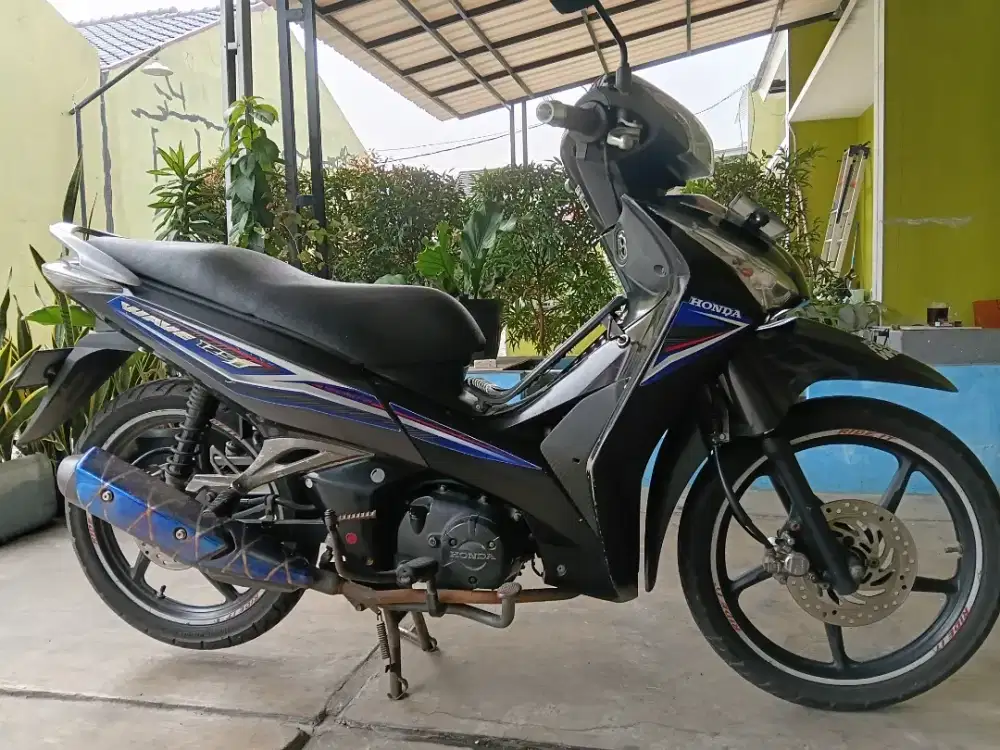 Supra x 125 helm in ( injeksi )
