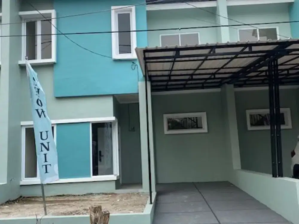 Rumah Tropical Modern 2 lantai lokasi boulevar jalan di Graha Kartika Pratama