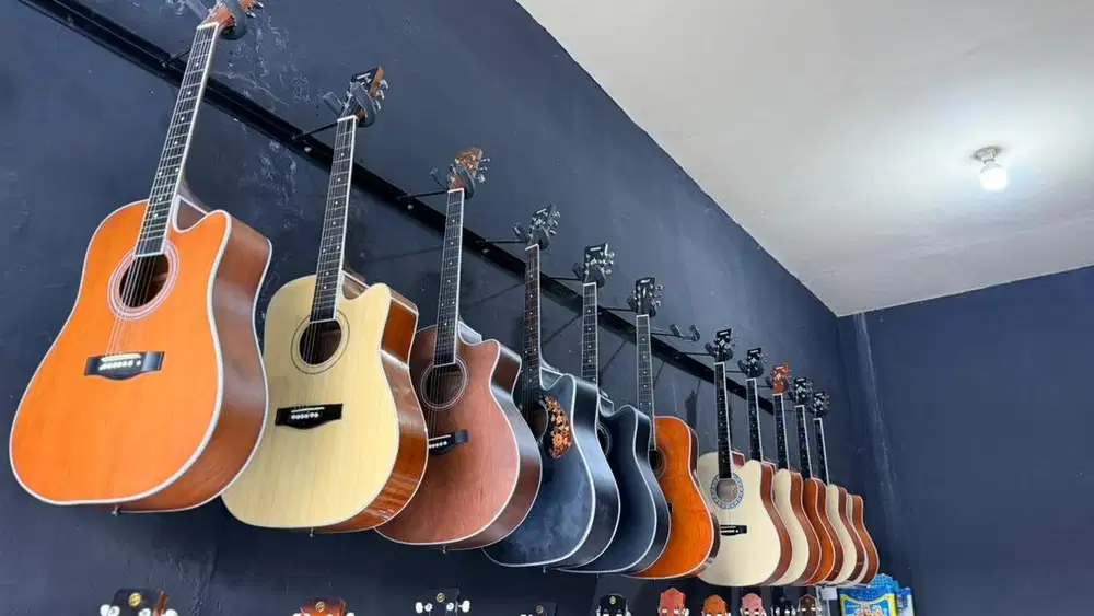 Gitar akustik tanam besi