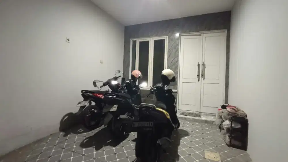 Di kontrakkan Rumah